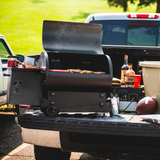 Traeger Tailgater 20 Black Pellet Grill - Lifestyle On Tailgate Hood Closed