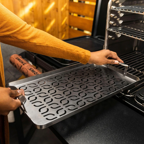 Traeger BAC610 ModiFIRE Fish & Veggie Stainless Steel Grill Tray - Placing in Grill